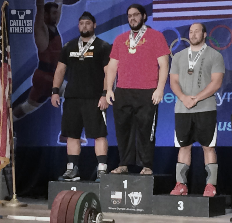 Brian Wilhelm (left) winning the silver medal in the 105+ kg category