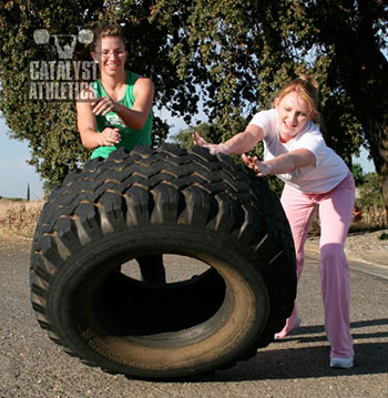 Team tire flipping. - Olympic Weightlifting, strength, conditioning, fitness, nutrition - Catalyst Athletics