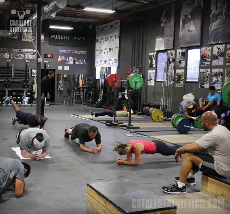Class working on planks - Olympic Weightlifting, strength, conditioning, fitness, nutrition - Catalyst Athletics 