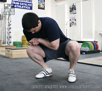 Squatting ankle stretch - Olympic Weightlifting, strength, conditioning, fitness, nutrition - Catalyst Athletics