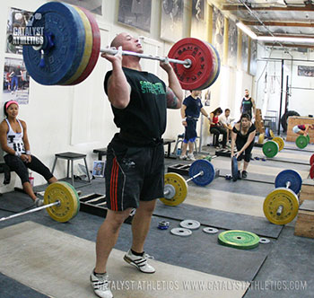 Kyle adjusting for the jerk rack position - Olympic Weightlifting, strength, conditioning, fitness, nutrition - Catalyst Athletics