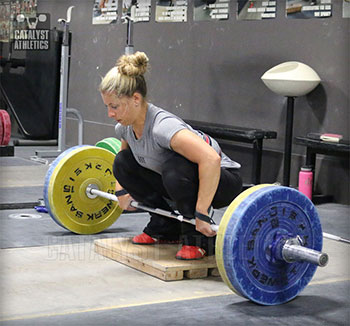 Danielle sets up for Clean Pull on Riser - Olympic Weightlifting, strength, conditioning, fitness, nutrition - Catalyst Athletics
